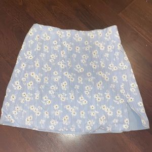 Blue skirt with daisy’s printed all over